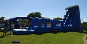 Children and families enjoying various rides and activities at the Australia Day festival in Cannington, 2021.