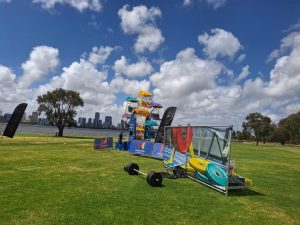A small, inflatable Ferris wheel ride for children at an event.
